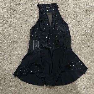 Came too late, never used and the tags are still on, solo dance Leotard